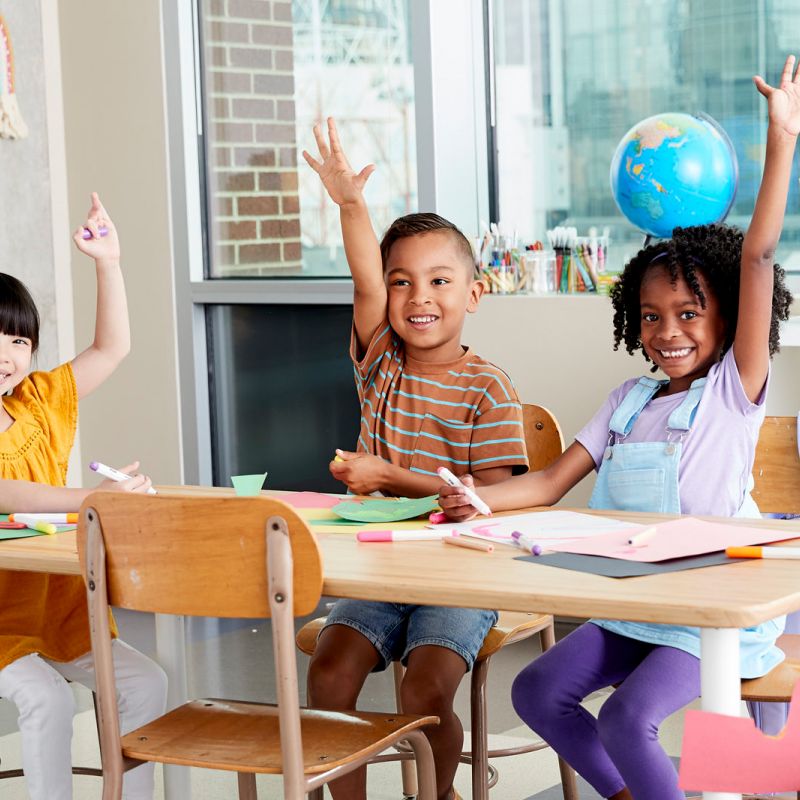 little girl plays with blocks