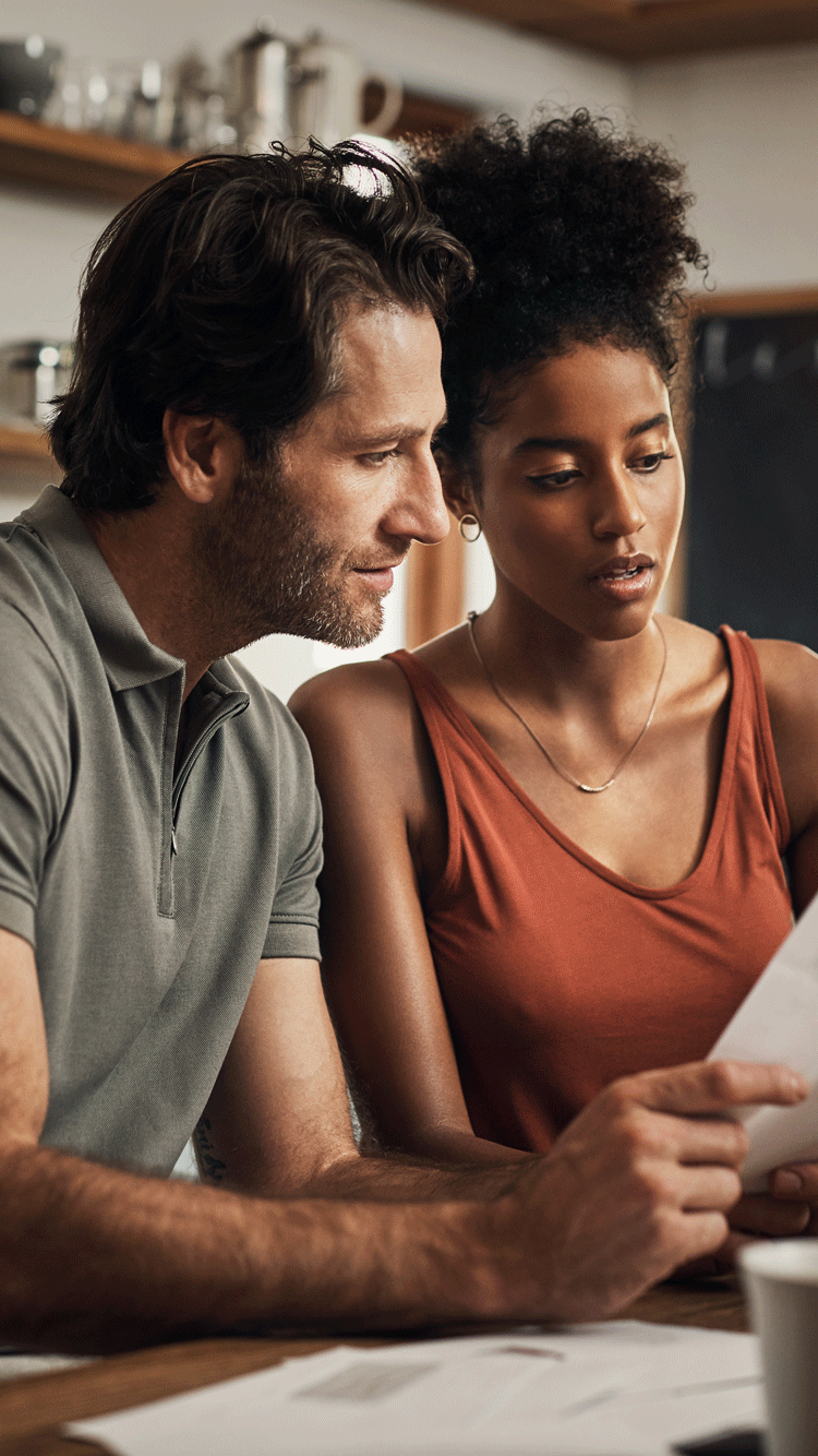 couple look over financials