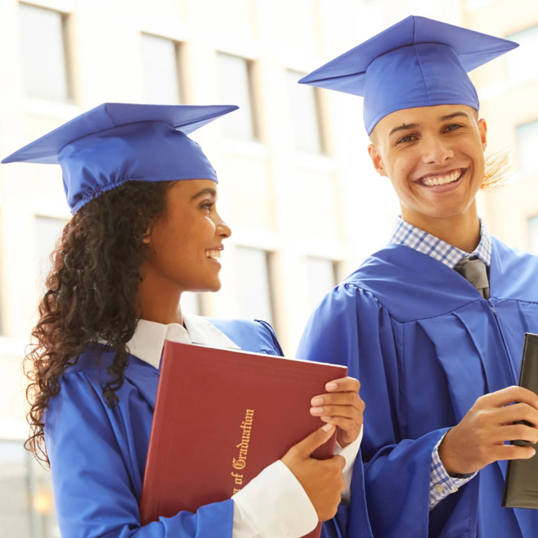 two boys playing with a robot